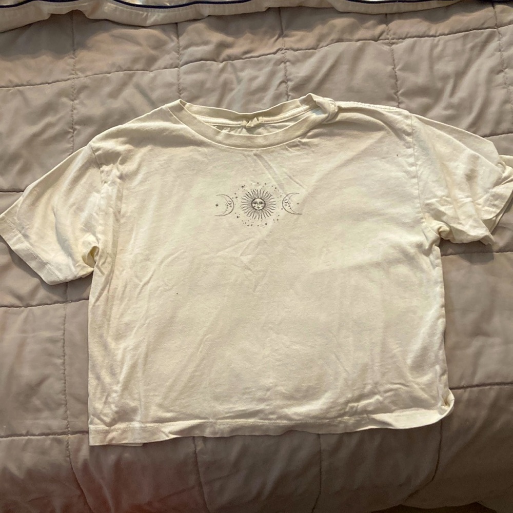 White tank top with sin and moon.